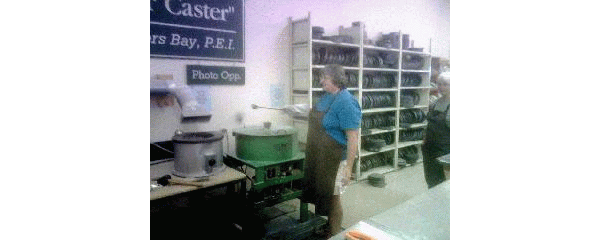 Pouring Pewter at St. Peter's Bay Craft and Gift Shop